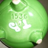 Green tripod pot with ceramic lid