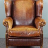 Armchair in patinated sheepskin leather