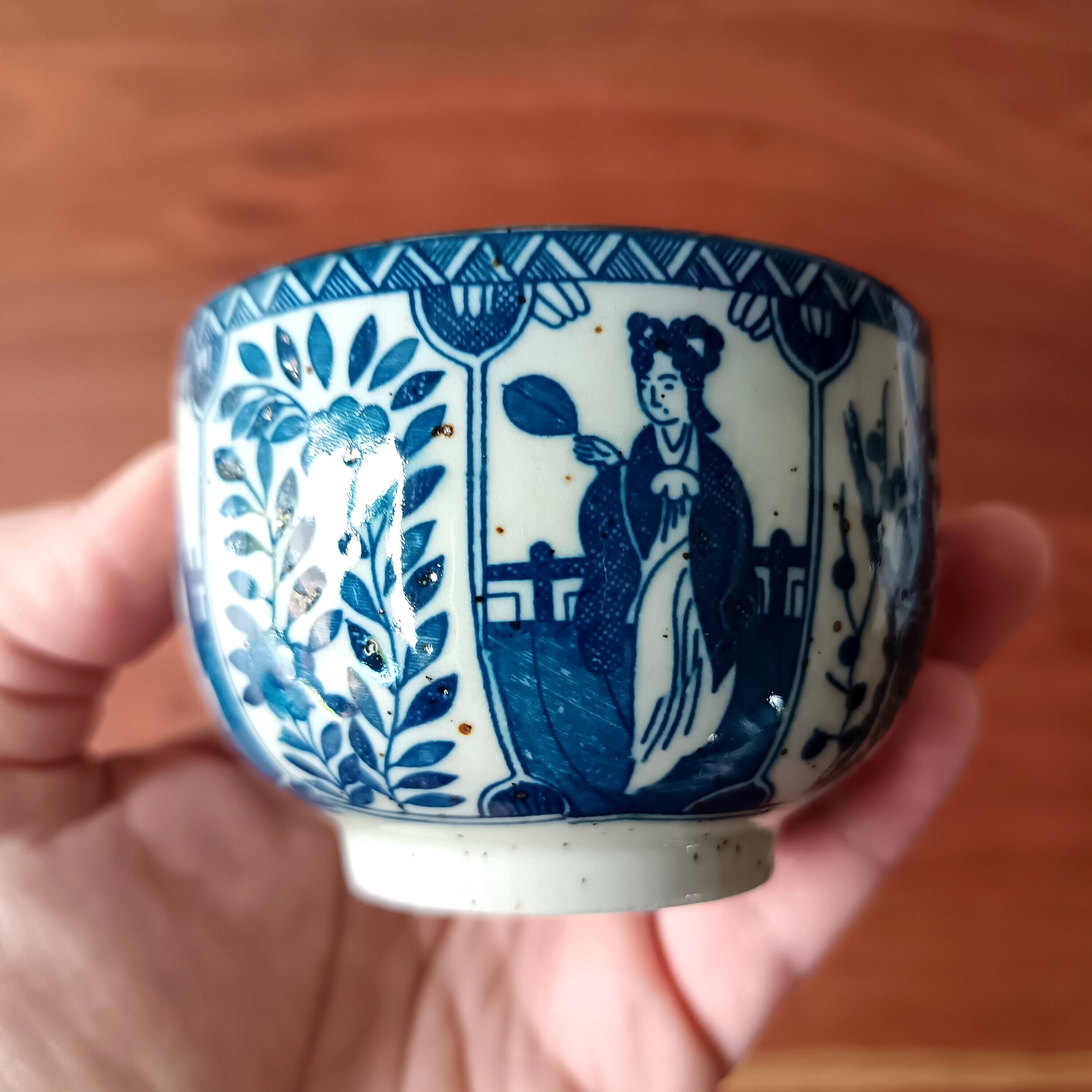 Asian ceramic and rattan tea set with plant geisha motifs