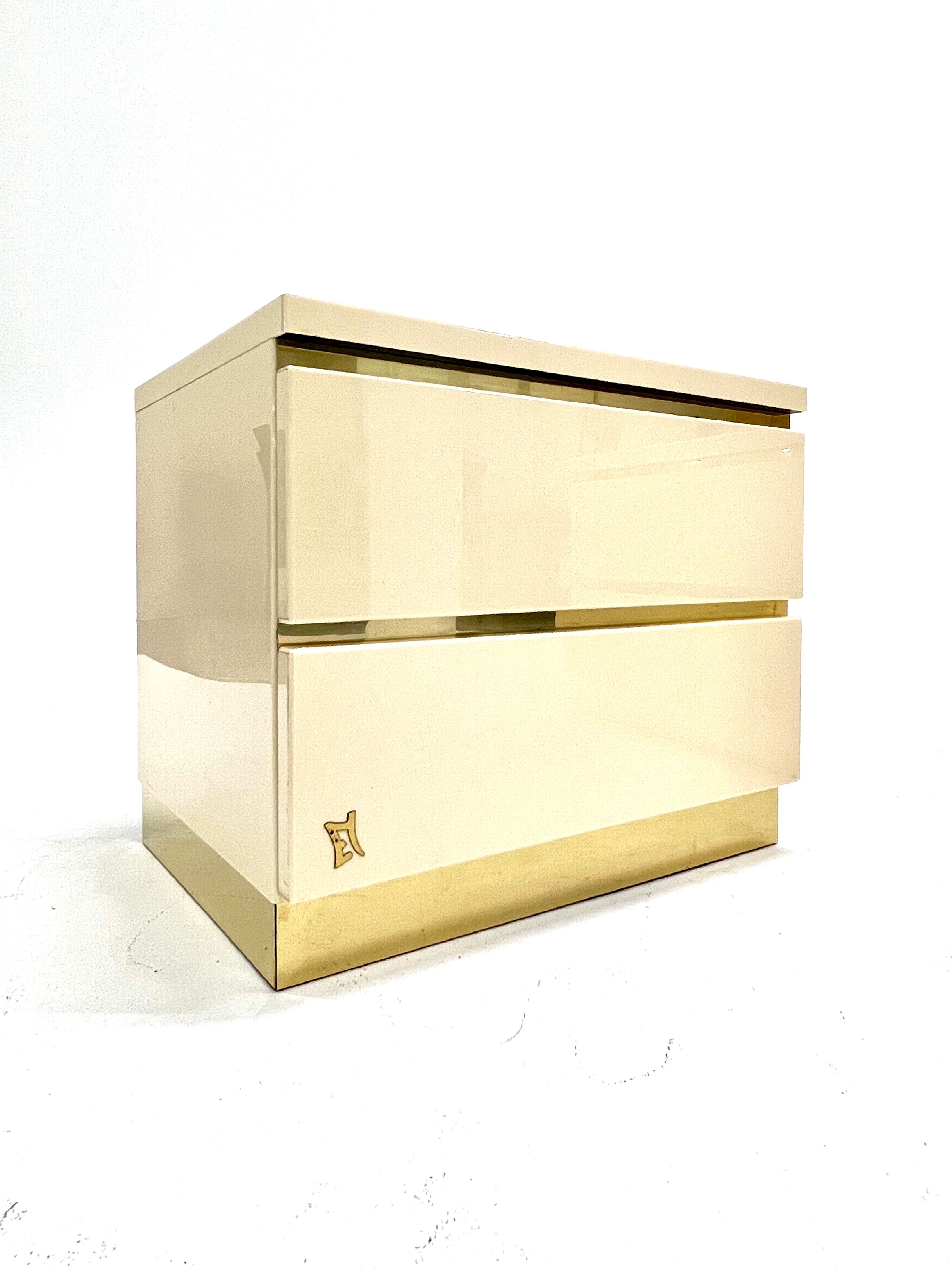 Pair of lacquer and brass bedside tables Éric Maville 1970