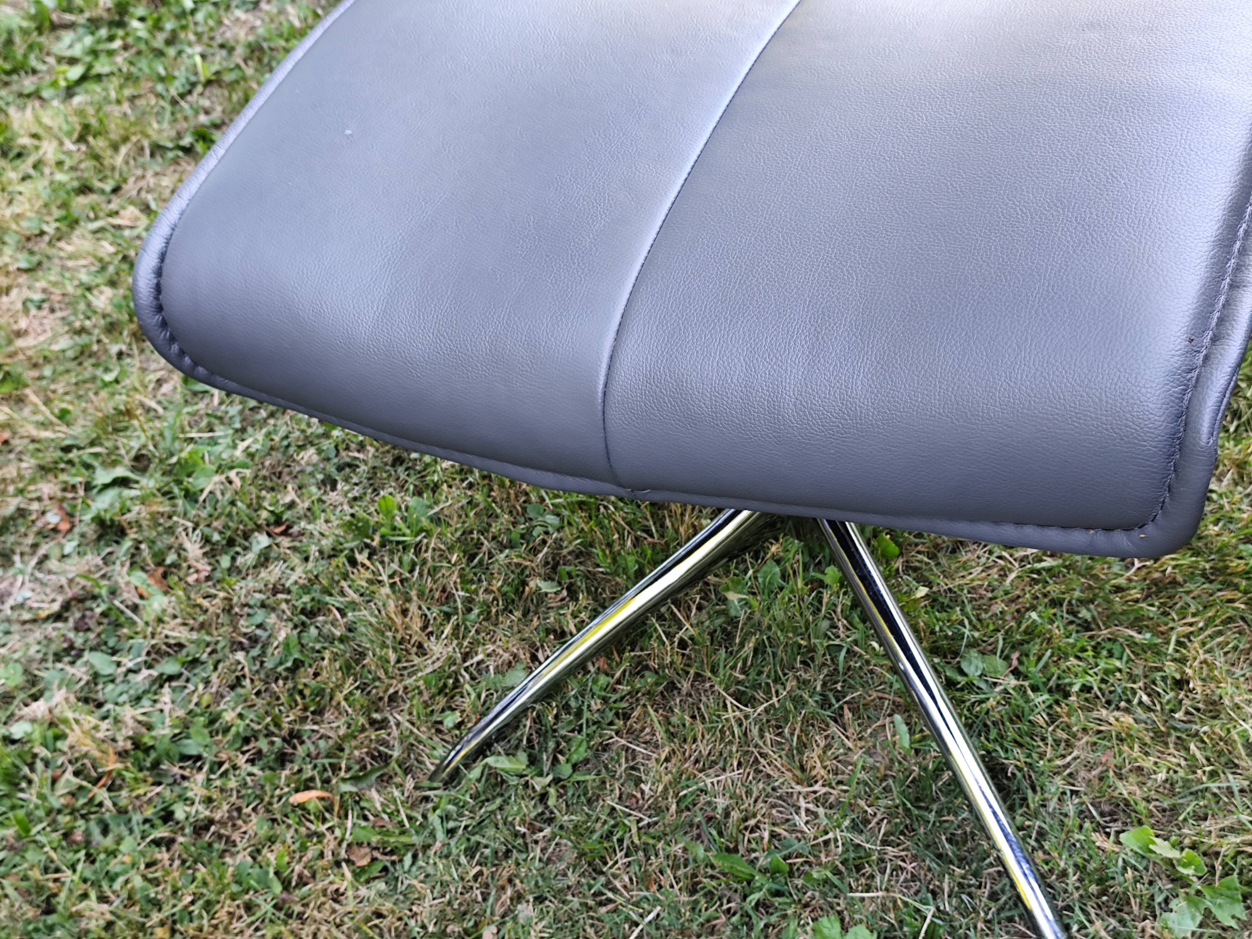 Stressless City armchair with footrest/ottoman, grey