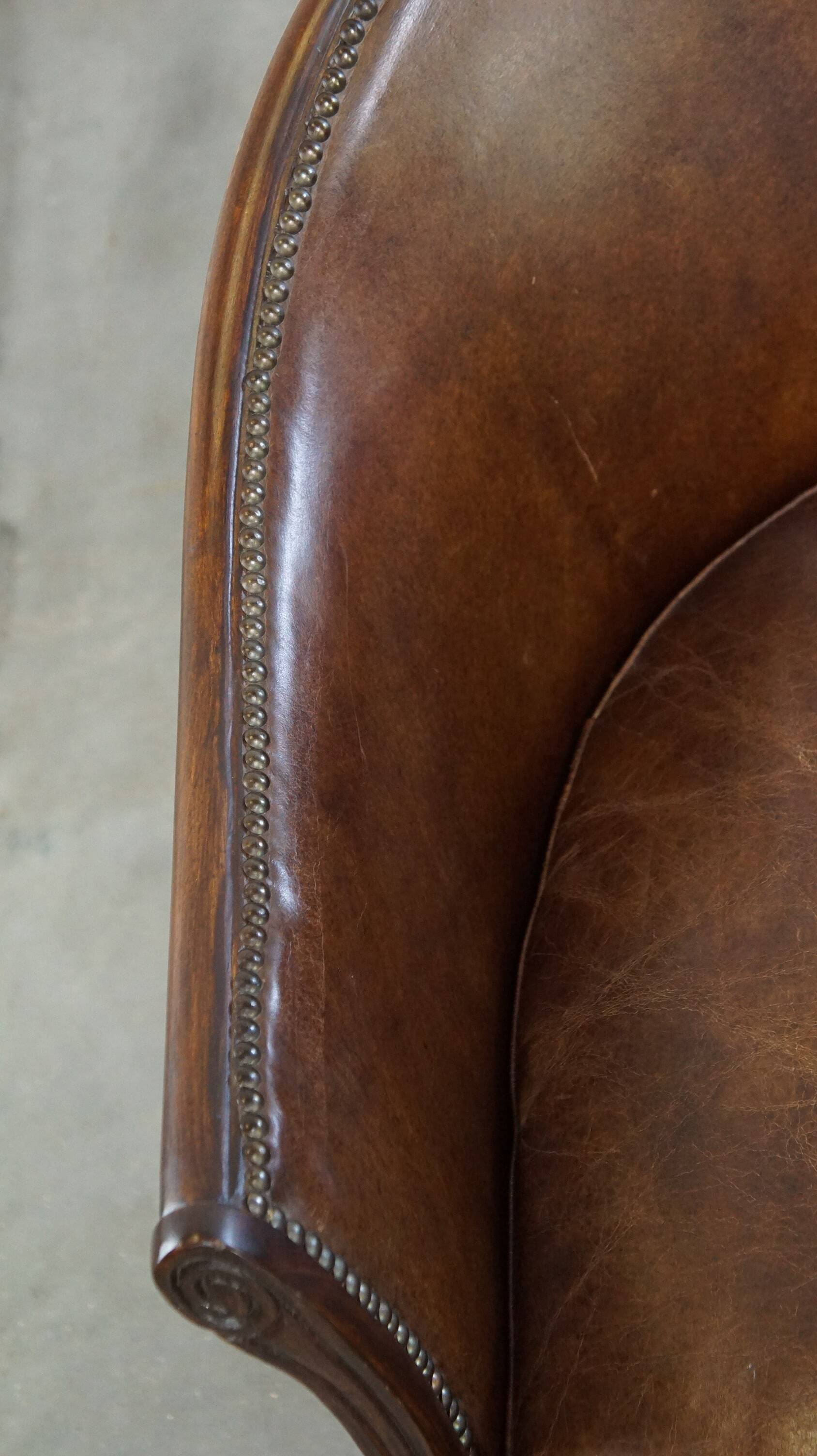 Set of 2 club chairs/armchairs in dark cognac leather