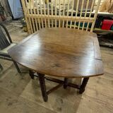 Wooden table with gateleg flaps