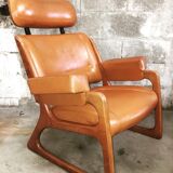 Armchair called "sled" Publisher Baumann and Ottoman