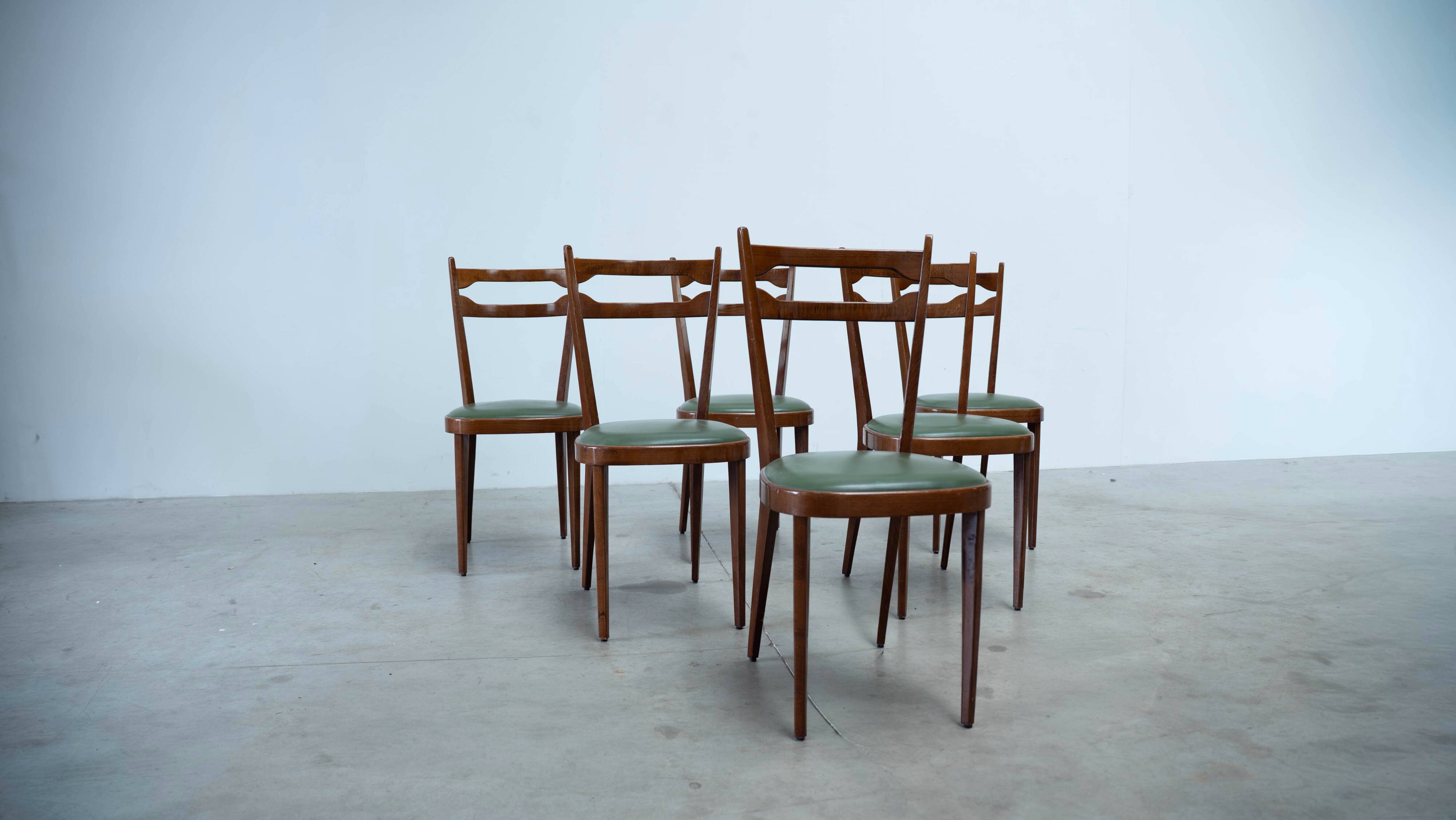 Set of six elegant Italian dining chairs