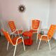 Lot de 4 chaises extérieur intérieur orange plastique et métal vintage années 70 jardin