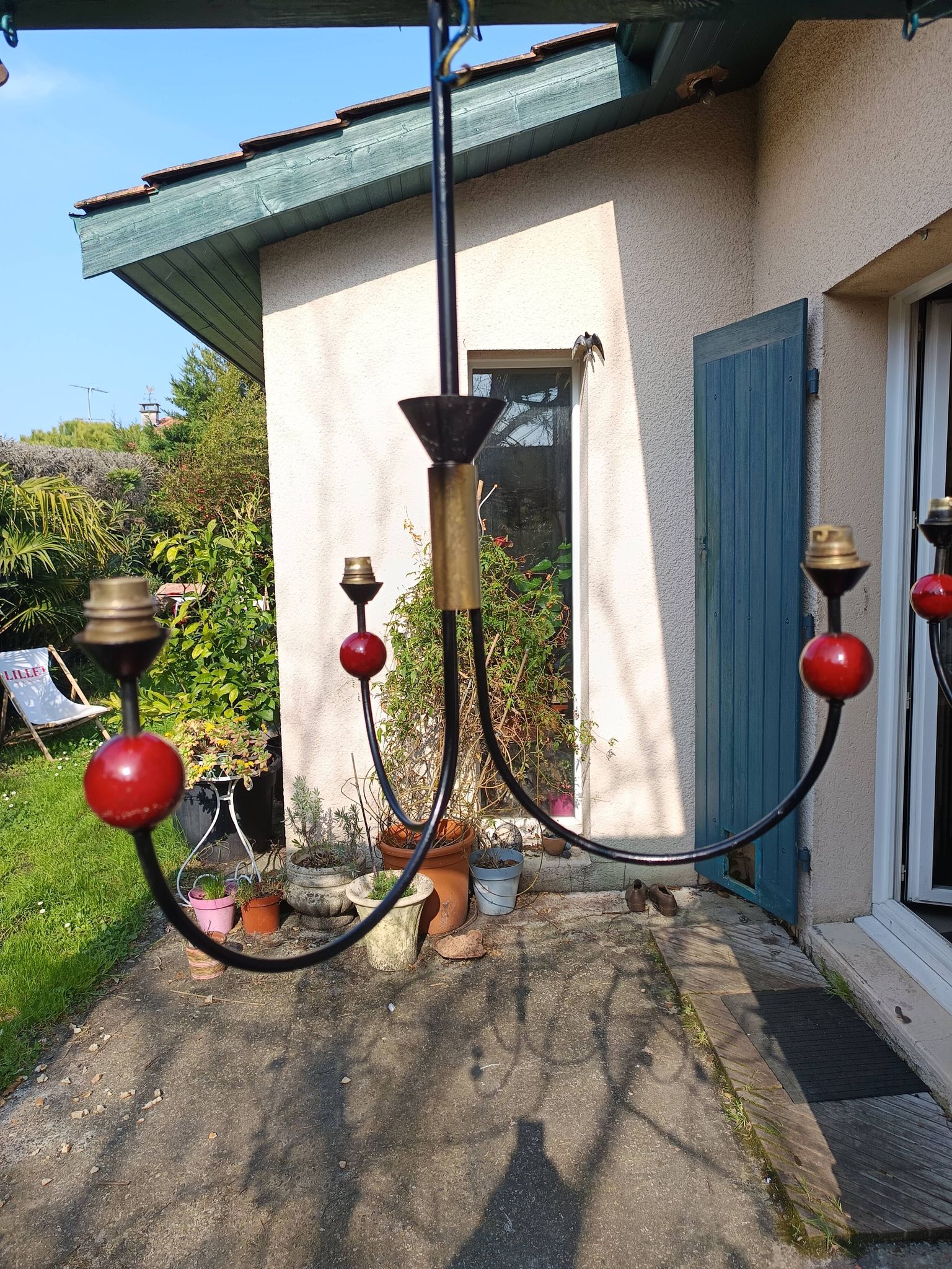 pair of vintage black metal chandeliers with red balls 1950/1970