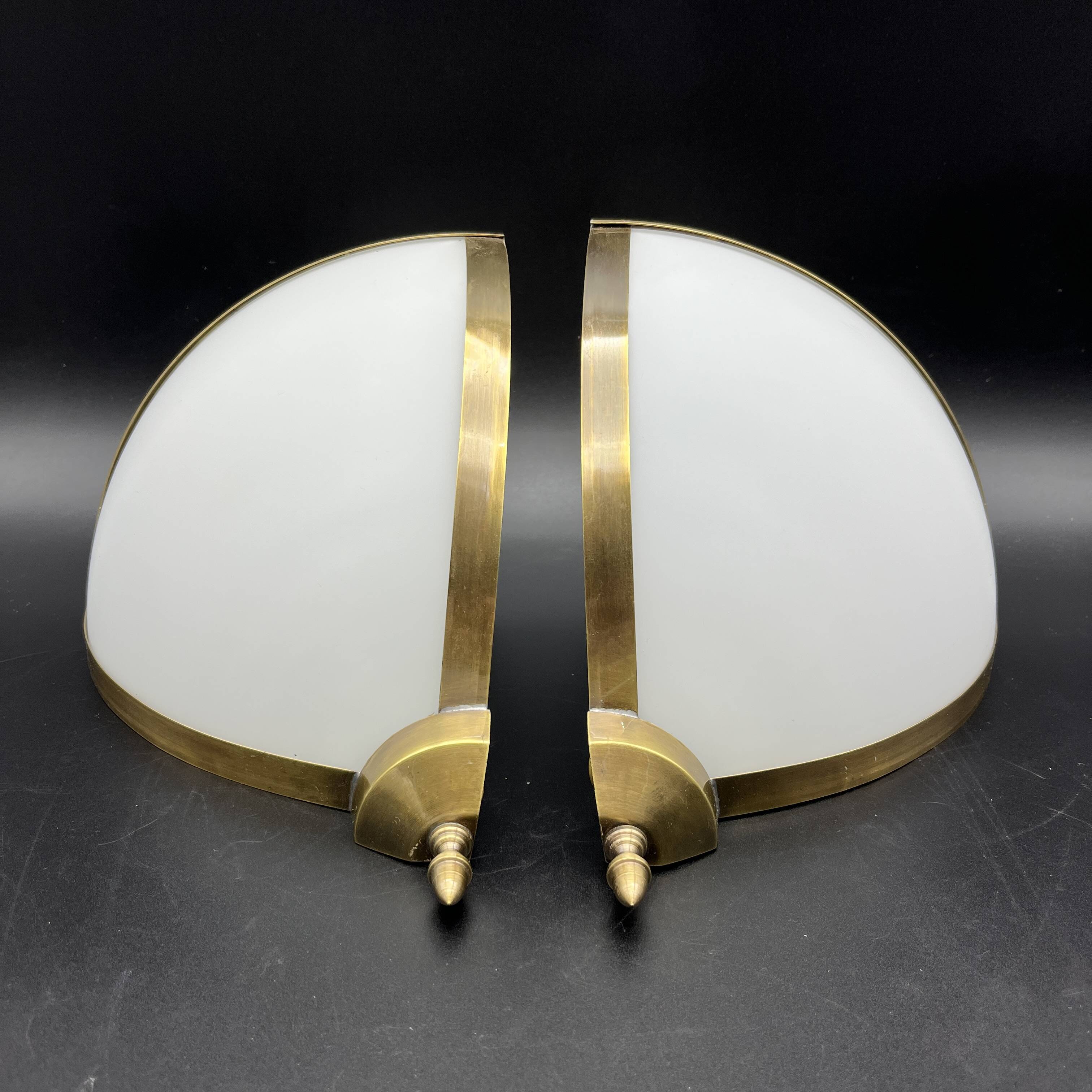 Pair of corner sconces in golden brass and matt opaline