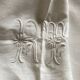 Tablecloth and 8 damask linen napkins embroidered RT circa 1900.
