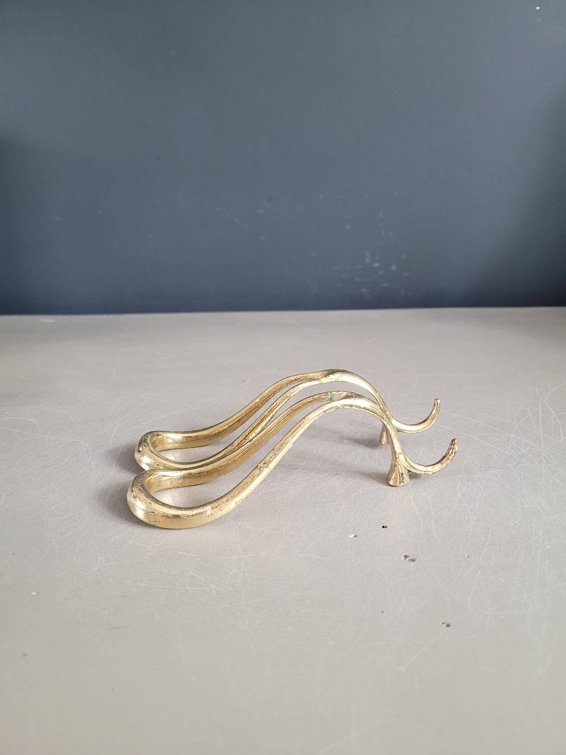 Antique brass pipe holder