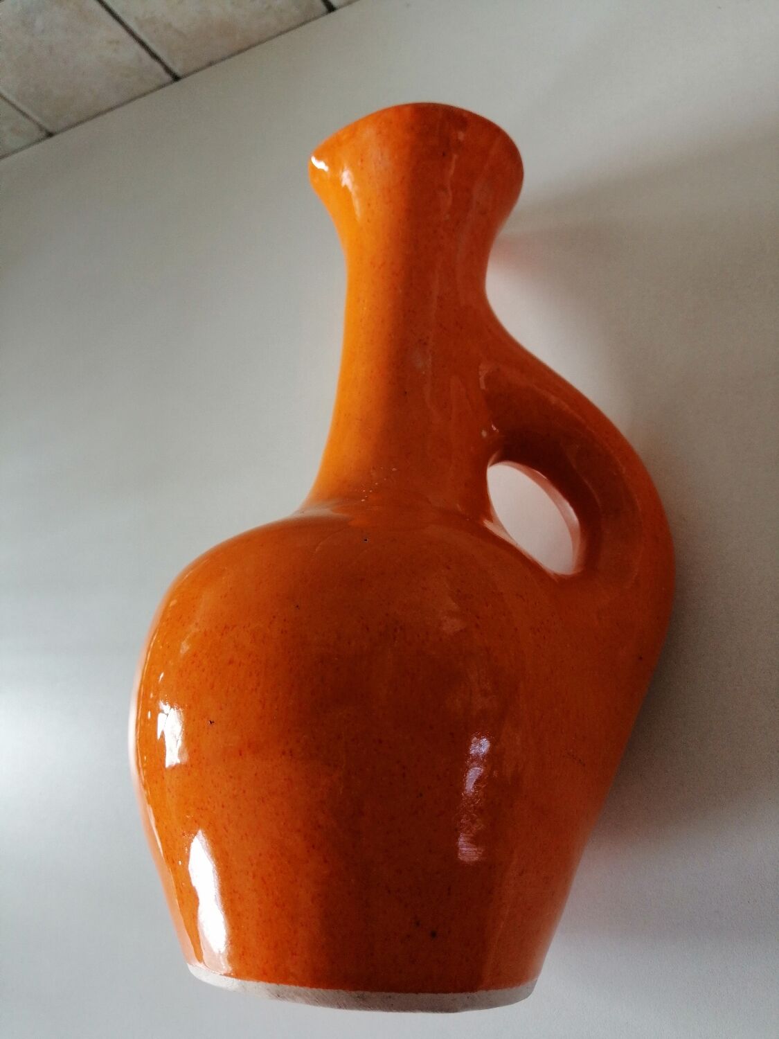 Orange terracotta vase