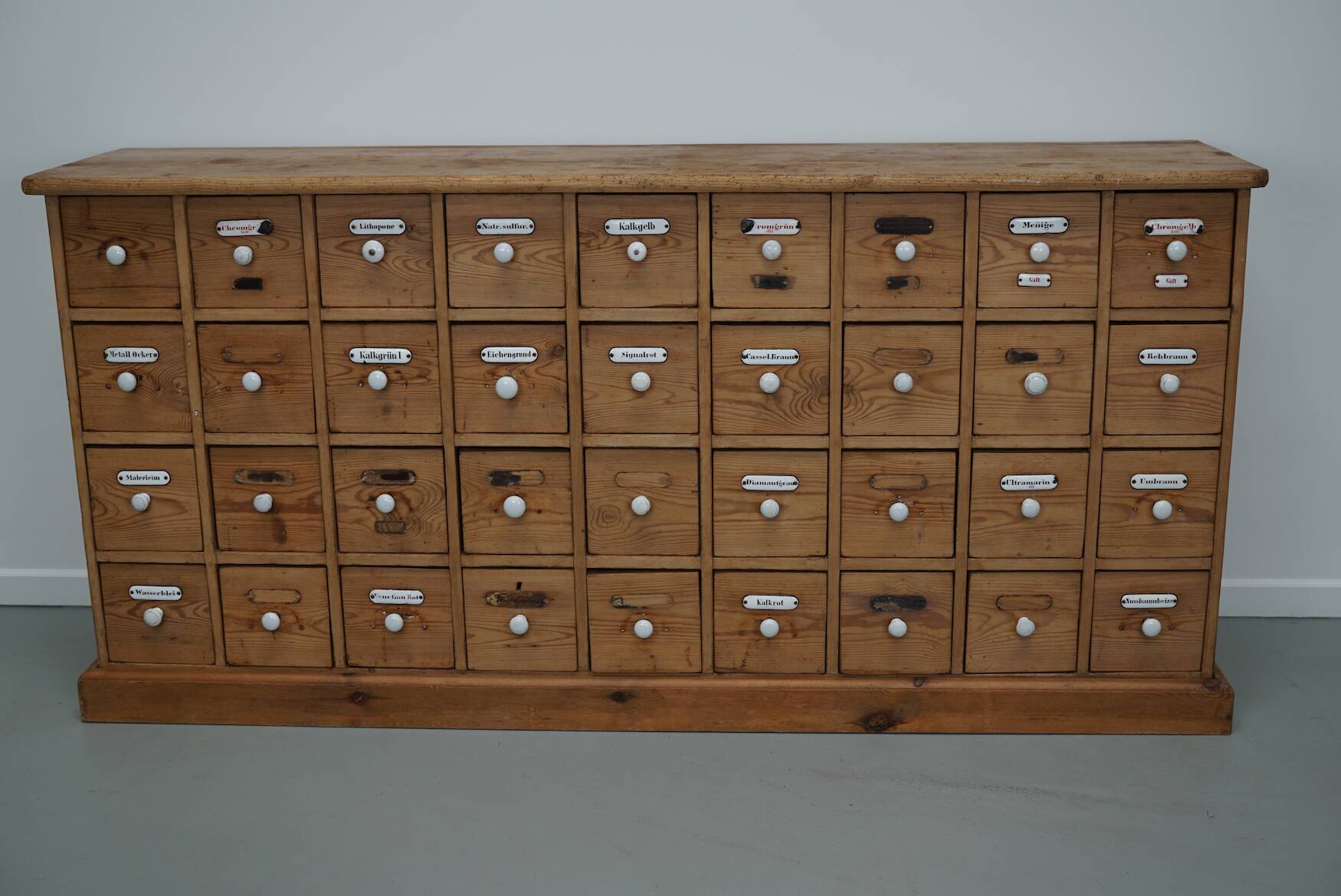 Antique German Pine Apothecary Cabinet with Enamel Shields, 1900s