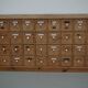 Antique German Pine Apothecary Cabinet with Enamel Shields, 1900s