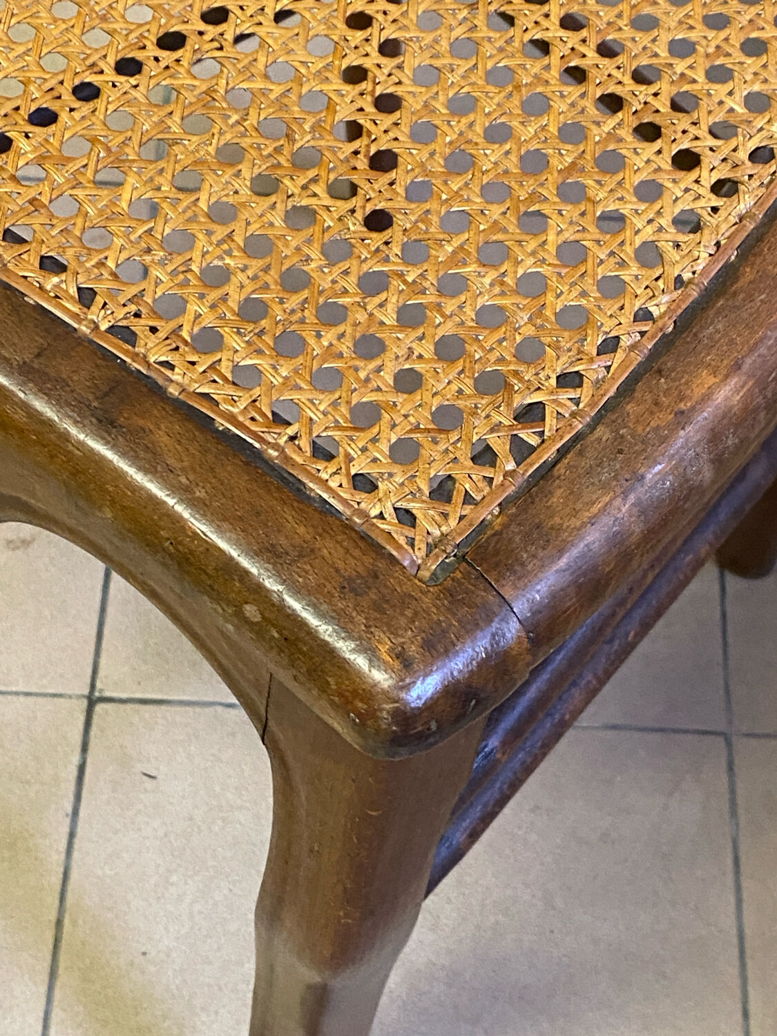 Antique wooden chair, cane seat