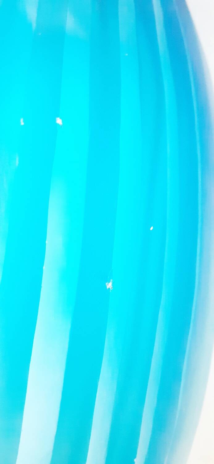 Antique turquoise glass vase