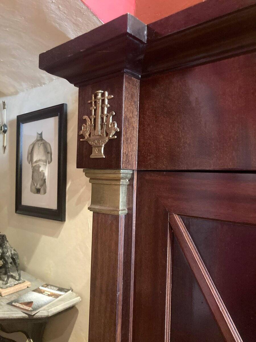 Cabinet, wardrobe or mahogany and ormolu wine bar in French Empire style with four doors.