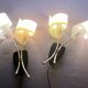 Pair of "vintage" wall lights in brass, perspex, and black bakelite, France Mid-Century