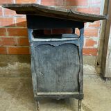 Antique writing desk, blackened wooden filing cabinet.