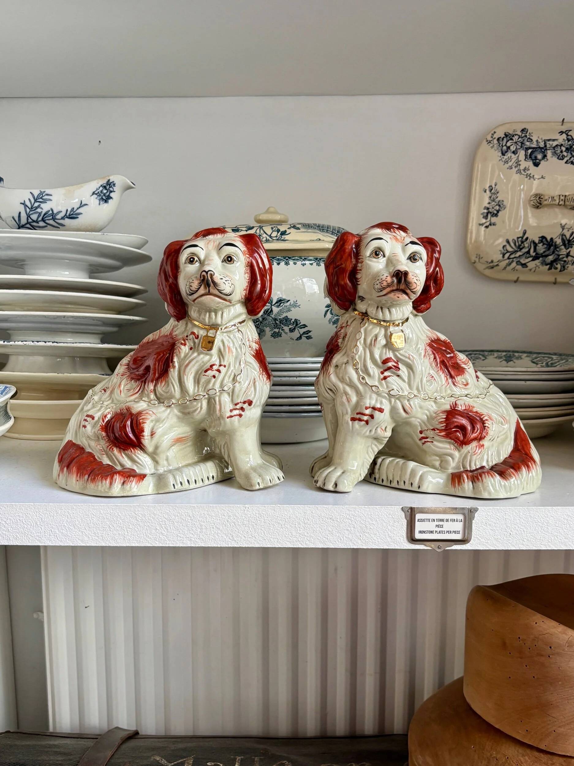 Pair of red Cavalier King Charles dogs in Staffordshire pottery, 19th century.