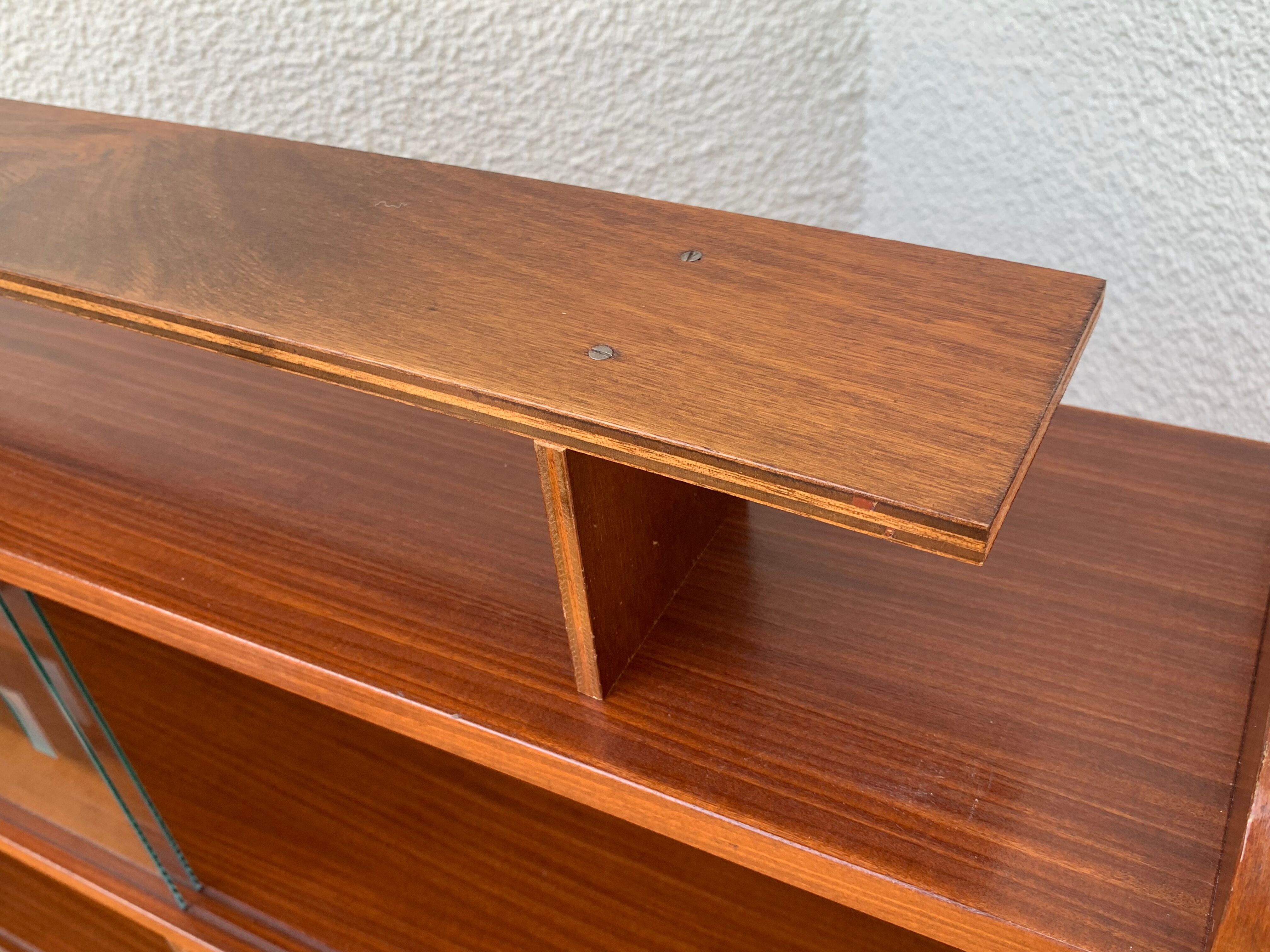 glass wall bookcase in vintage teak 1950