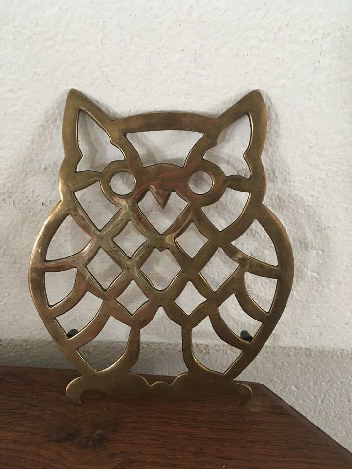 Under the nice brass dish.