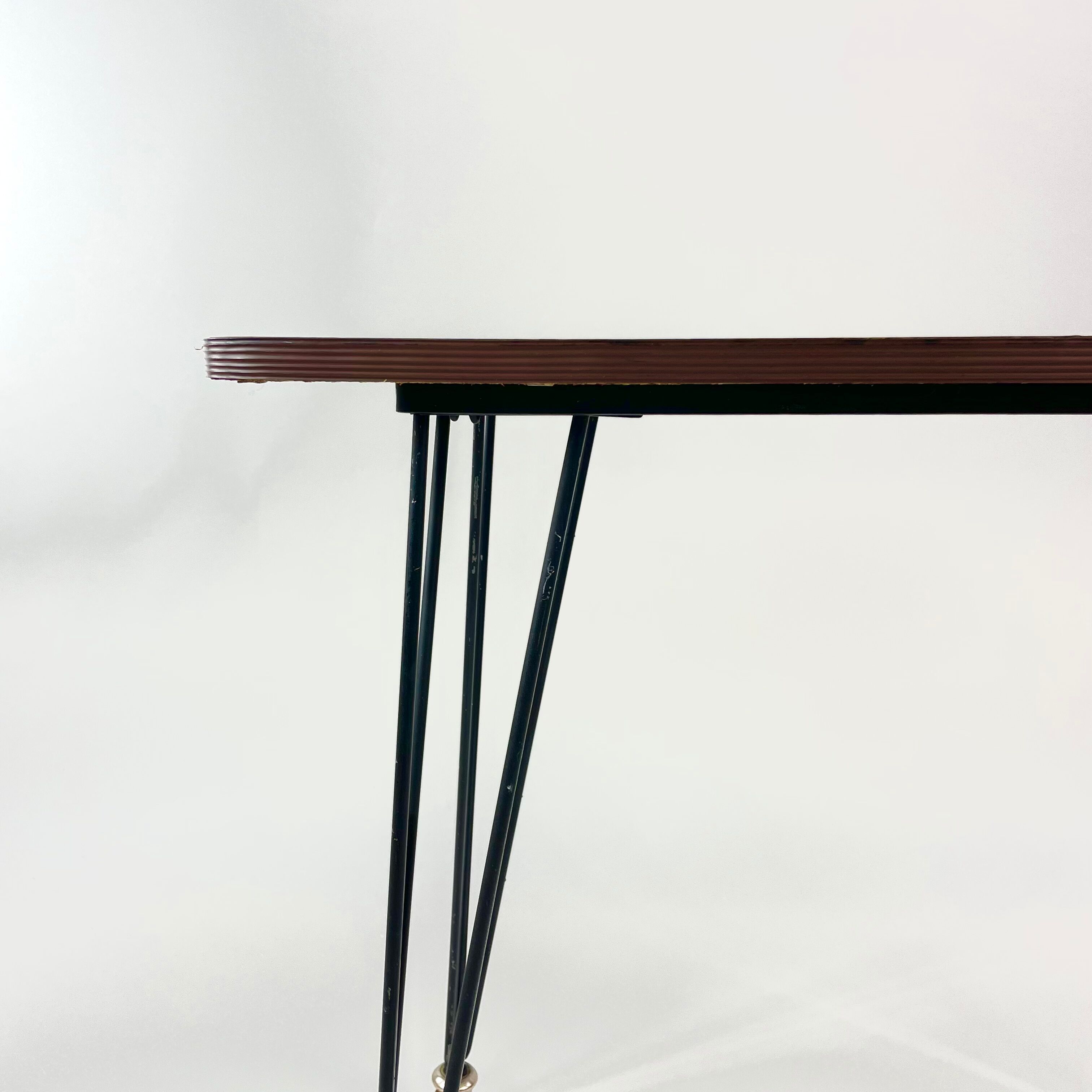 Table on wheels, laminate top and metal Eiffel legs, circa 1950