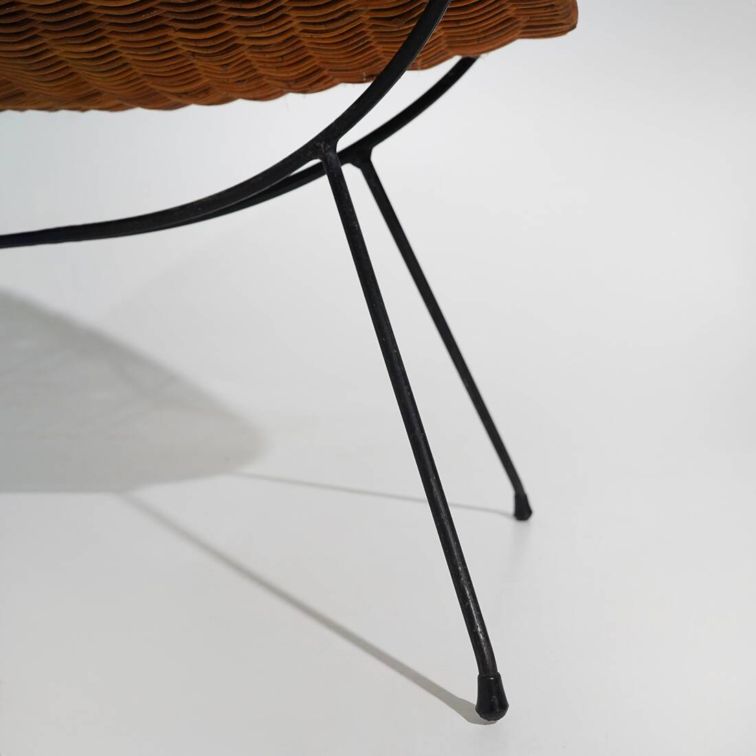 Rattan magazine rack with metal legs, 1950s