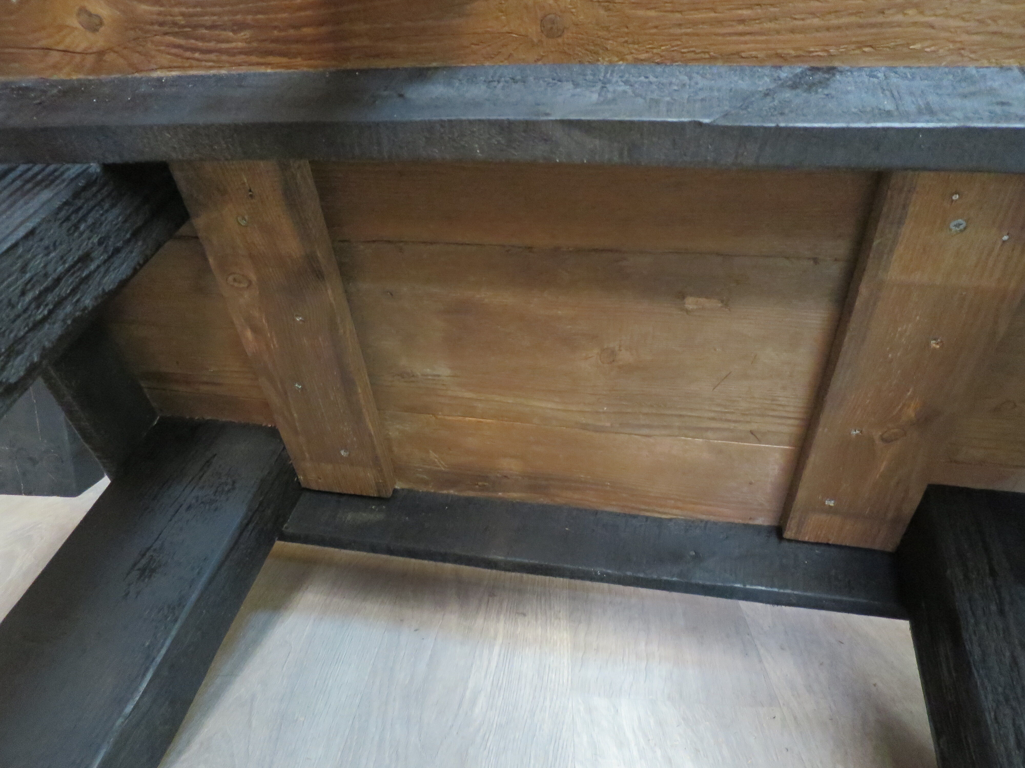 Dark solid wood farmhouse table
