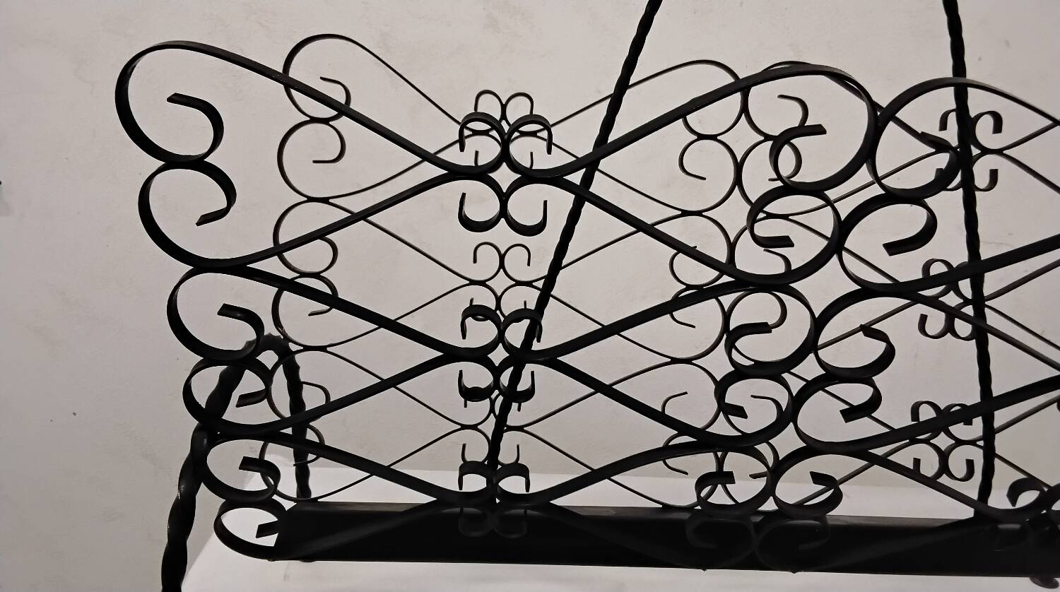 Wrought iron magazine rack signed CHATY Vallauris