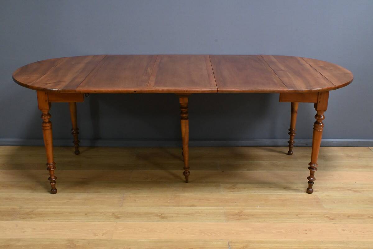 Table for 4 to 10 people with cherry wood extensions, Louis Philippe style – Late 11th century