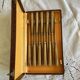 Set of 11 Apollonox table knives in a box