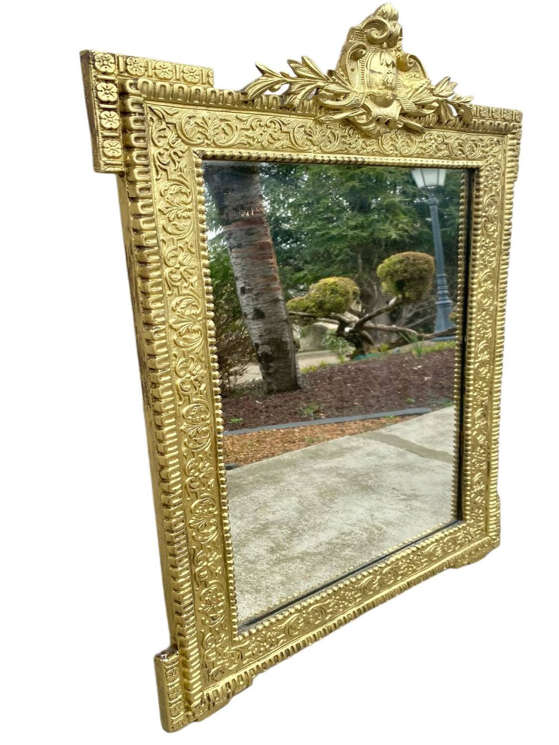 Two antique 19th century mirrors in carved Napoleon oak wood