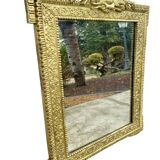 Two antique 19th century mirrors in carved Napoleon oak wood