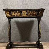 Lacquered work table, blackened wood decorated with Chinese scenes, Napoleon III period circa 1850