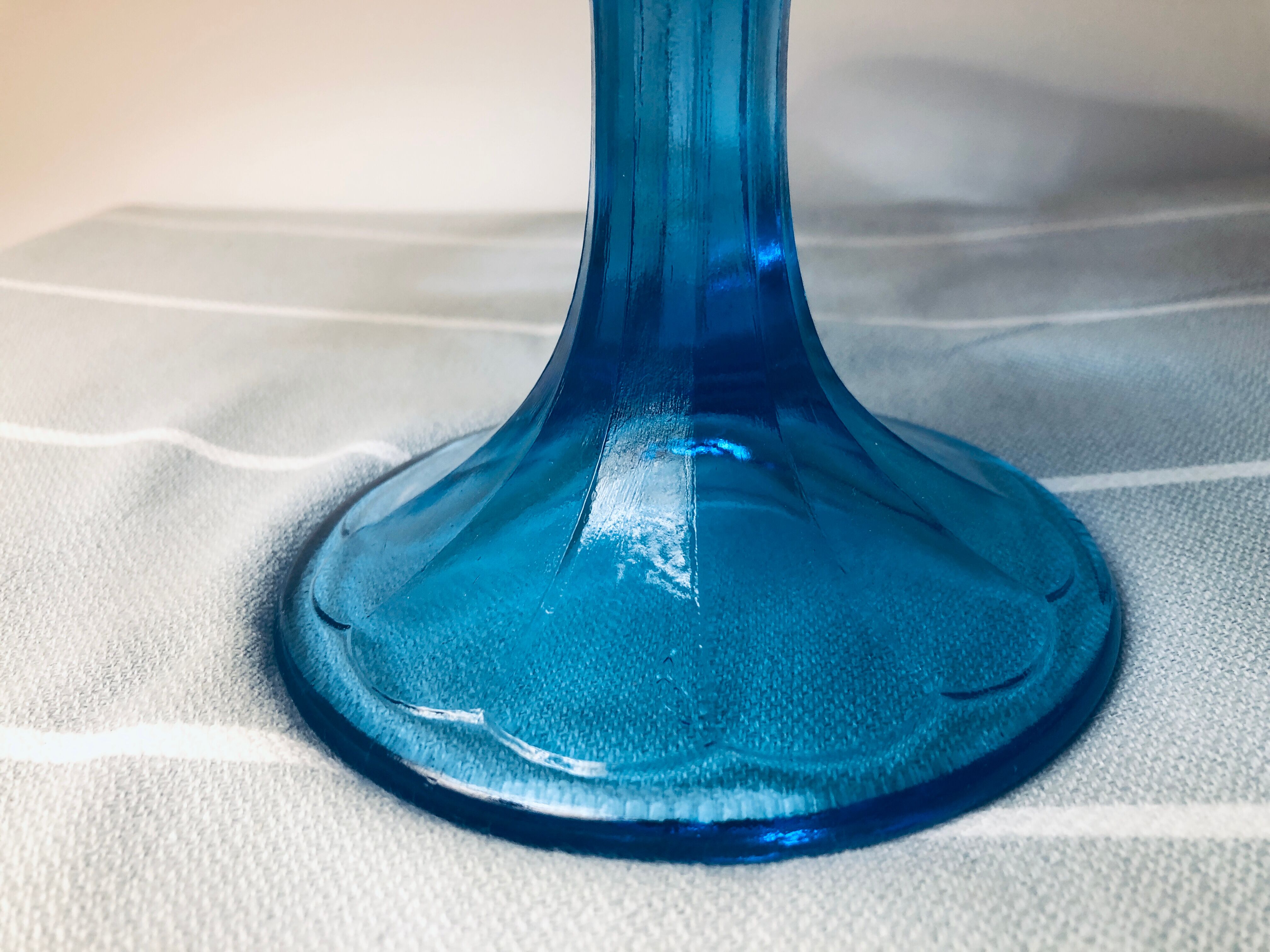 Blue vintage glass cake display