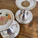 Pair of silver metal candle holders