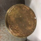 Old foot cast-iron bistro and brass round tray