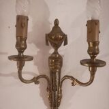 Pair of Louis XVI style sconces in gilded bronze