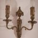 Pair of Louis XVI style sconces in gilded bronze