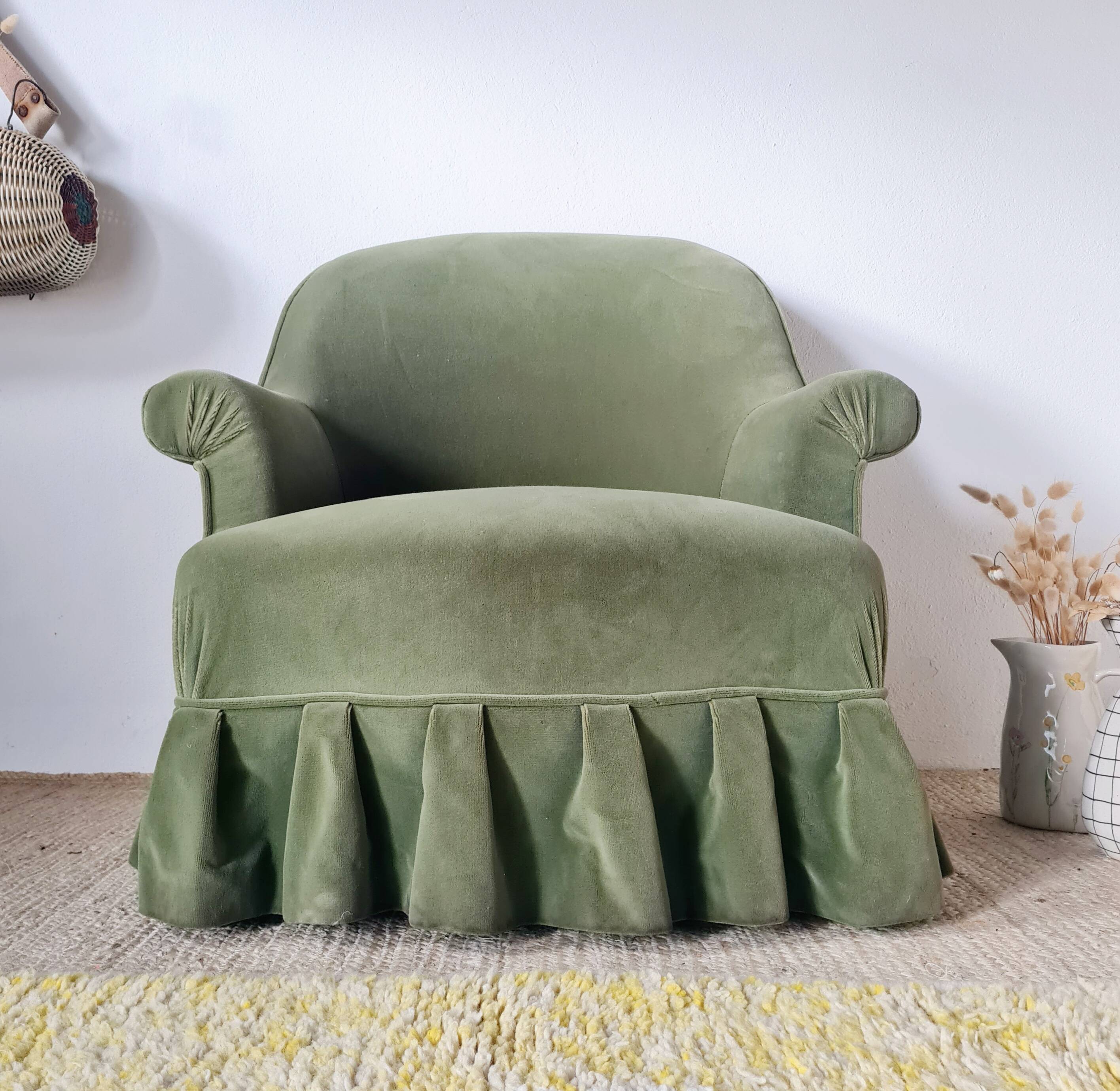 Green velvet armchair