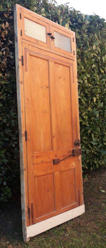 Front door and its frame, translucent glass windows, early 20th century