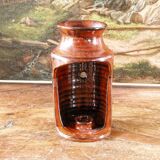 Signed orange ceramic candle holder and jug