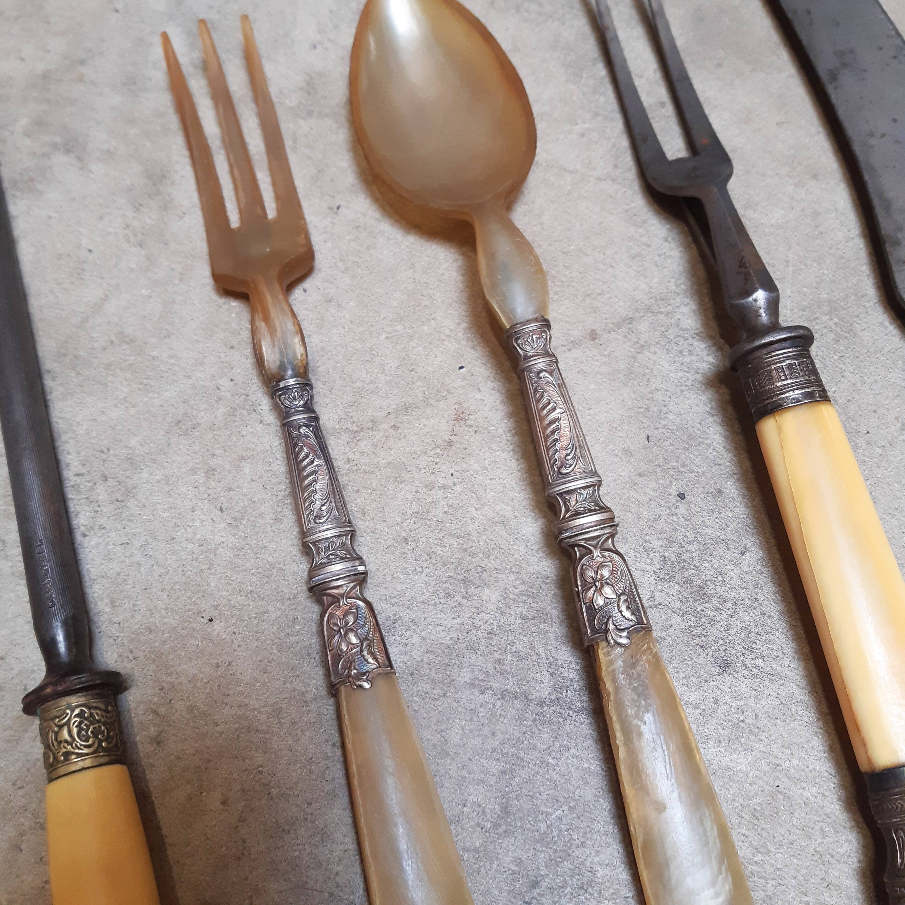 Assortment of antique serving cutlery
