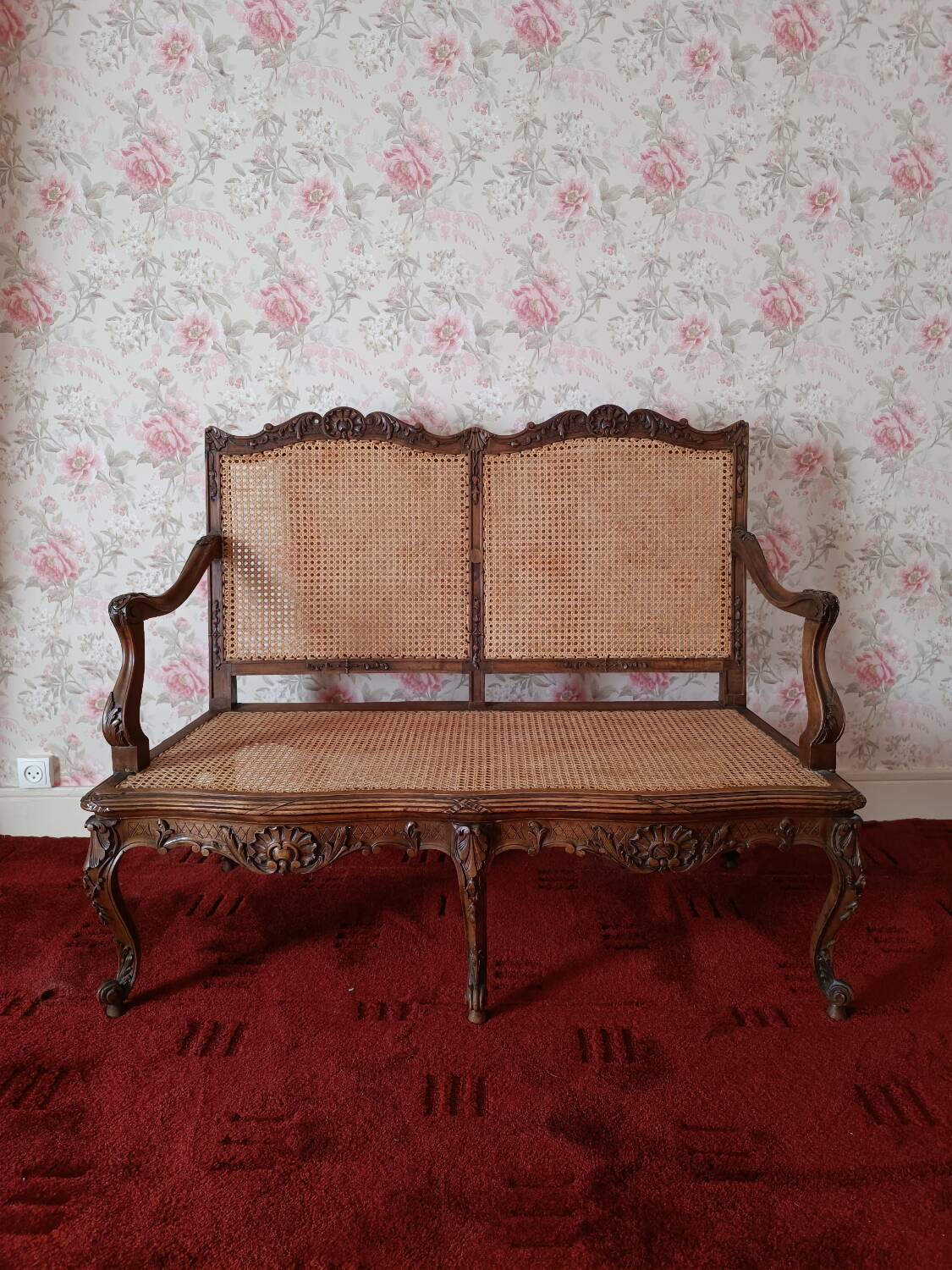 Antique bench in solid carved wood and wicker caning