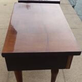 2 Bedside tables typical of the 50s in mahogany-colored varnished wood.