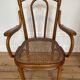 Old thonet armchair in curved wood and rattan cane