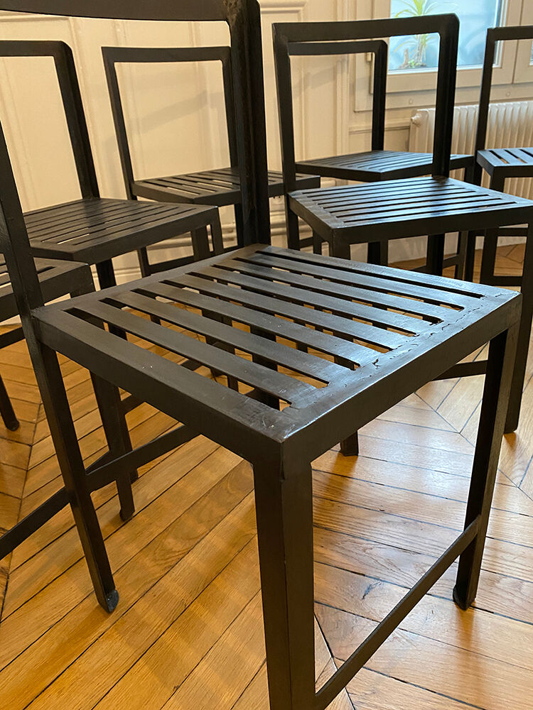 Set of 8 patinated and waxed raw steel chairs