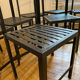 Set of 8 patinated and waxed raw steel chairs