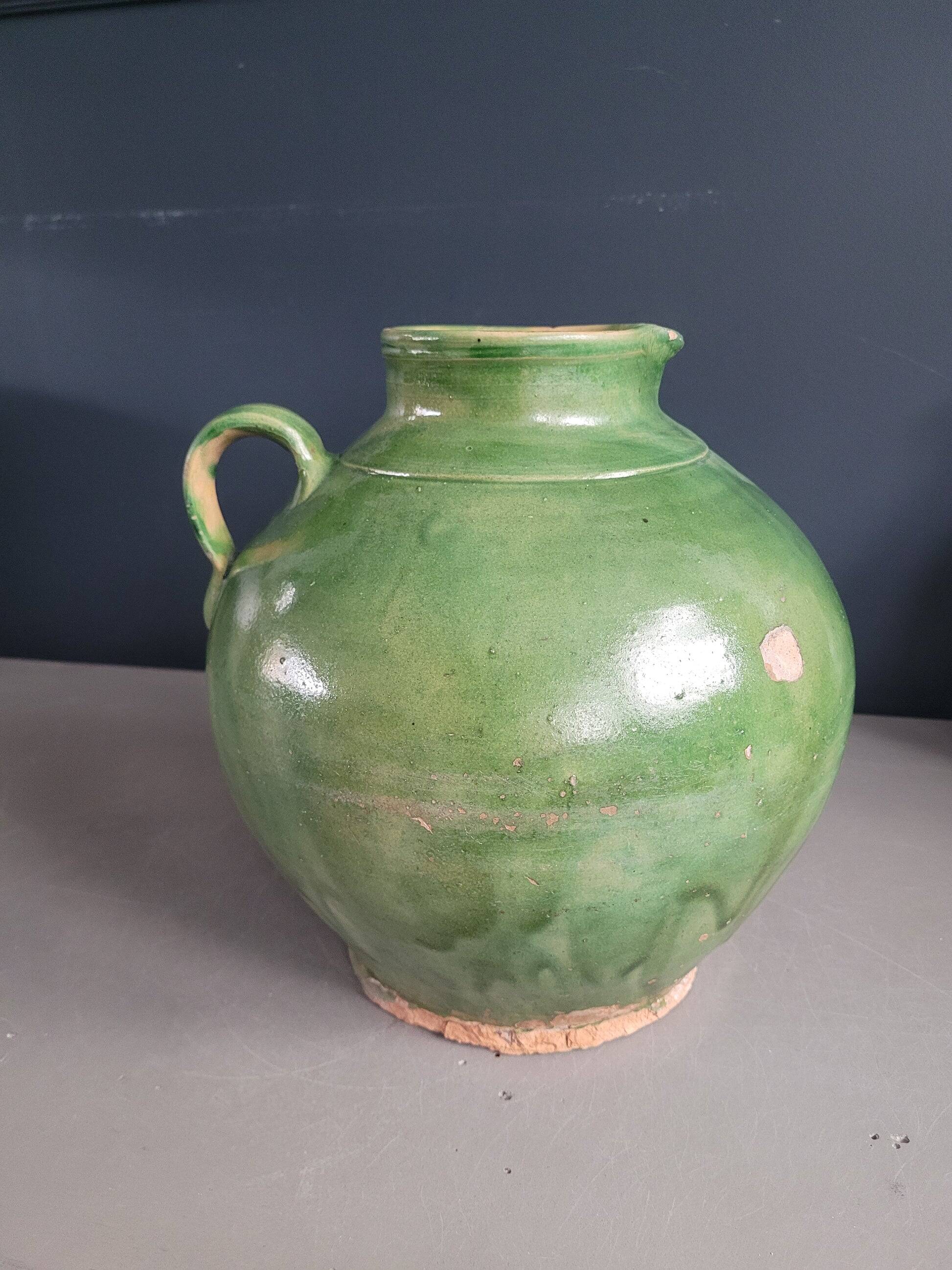 Green glazed terracotta jar