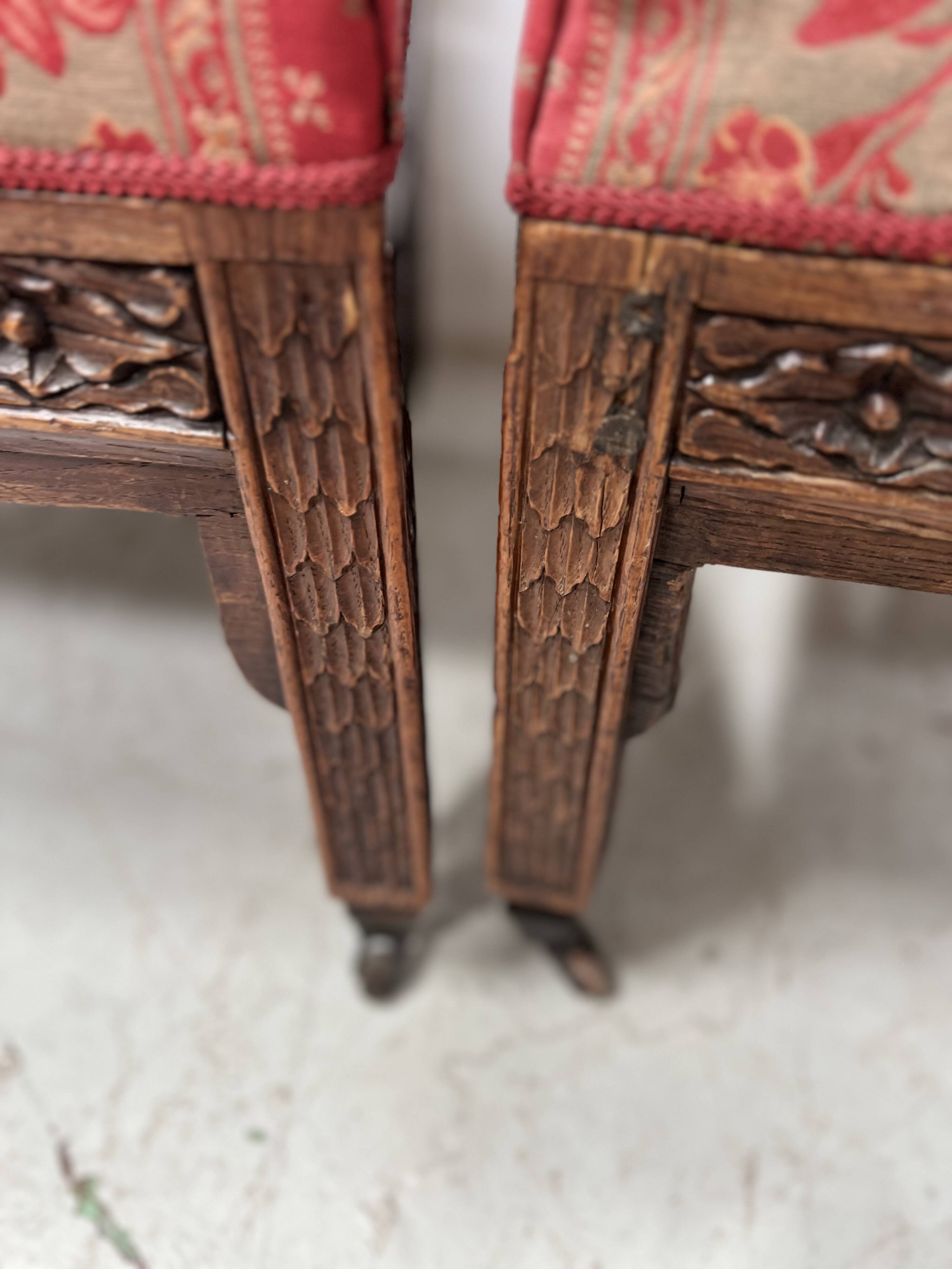 Pair of Gothic-style walnut lounge chairs, 19th century